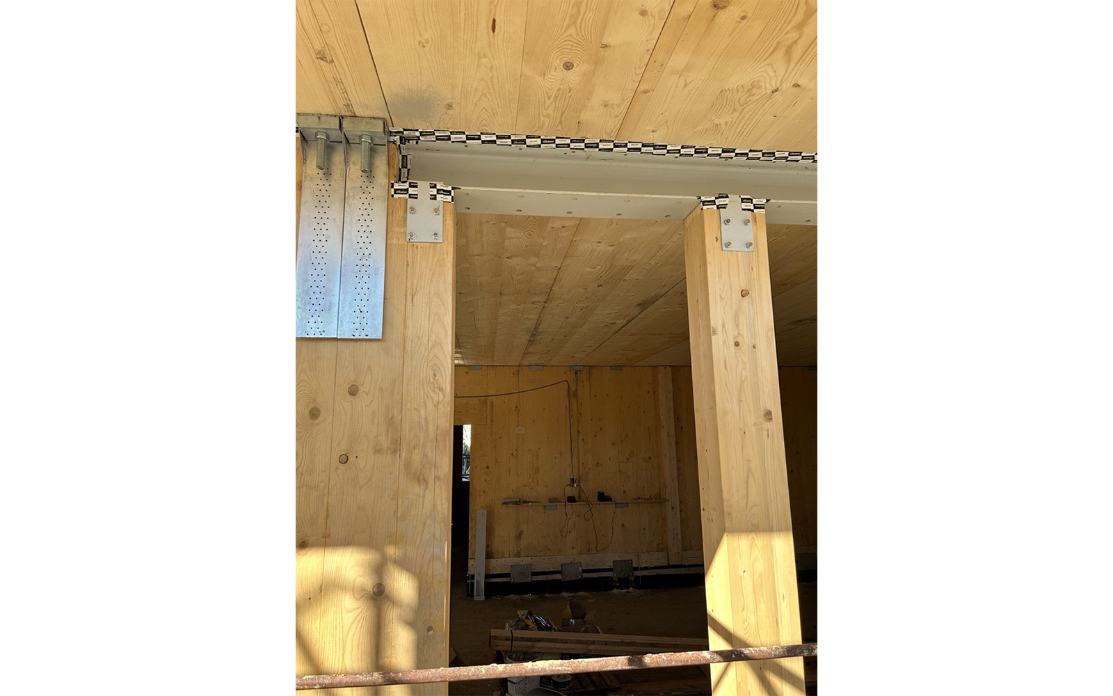 Airtightness tape in building site with cross-laminated timber elements